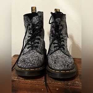 Paint-splattered Doc Martin boots
